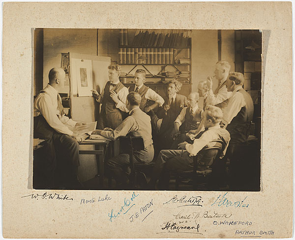 Harold Cazneaux, Sydney Camera Circle, 1924. First Australian Salon of Photography meeting in Sydney1924. From left to right: W. White holding print, Monte Luke at easel, J. Paton, H. Cazneaux, S. Eutrope, C. Wakeford, Webster with pipe, A. Smith | in front: J. McColl, C. Bostock (National Gallery of Australia)